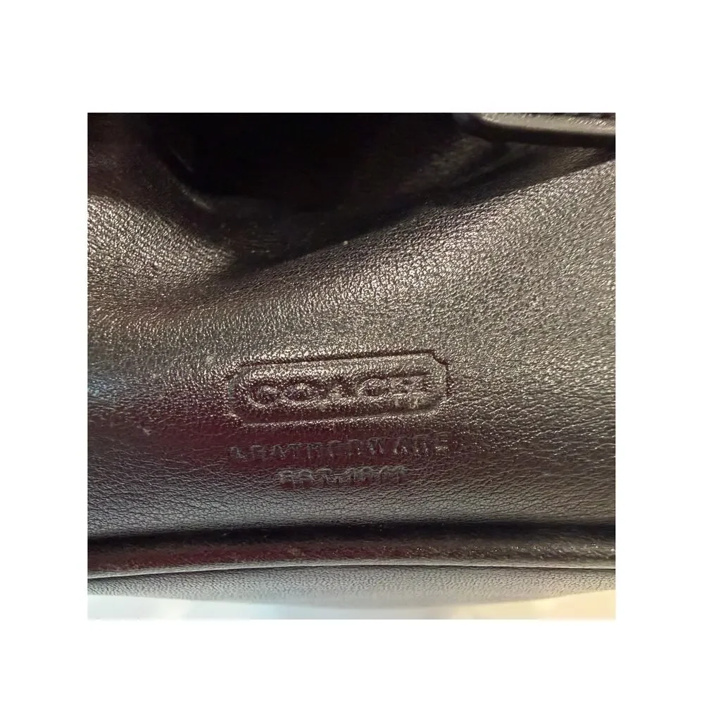 Coach black leather toiletry bag